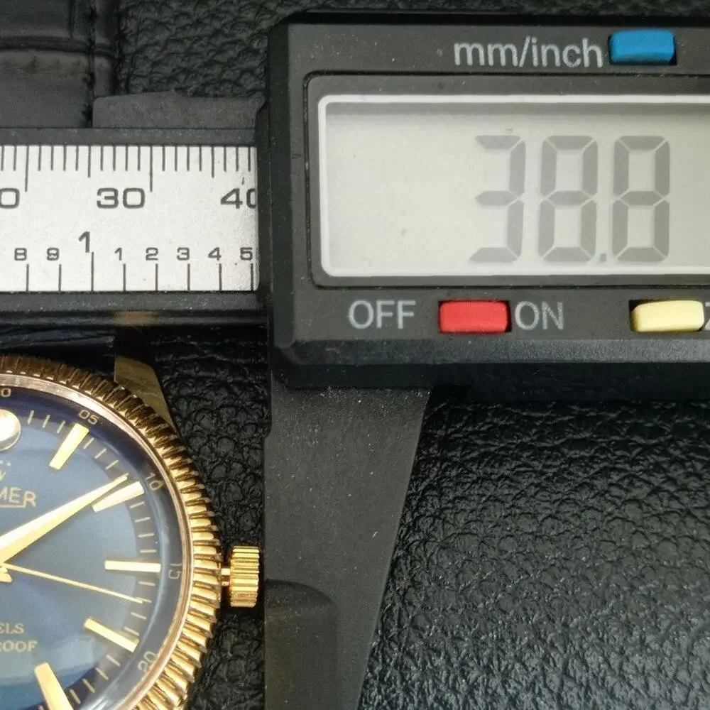 Vintage 1974 Roamer Manual Mens Gold Watch W/Leather Strap & Blue accents